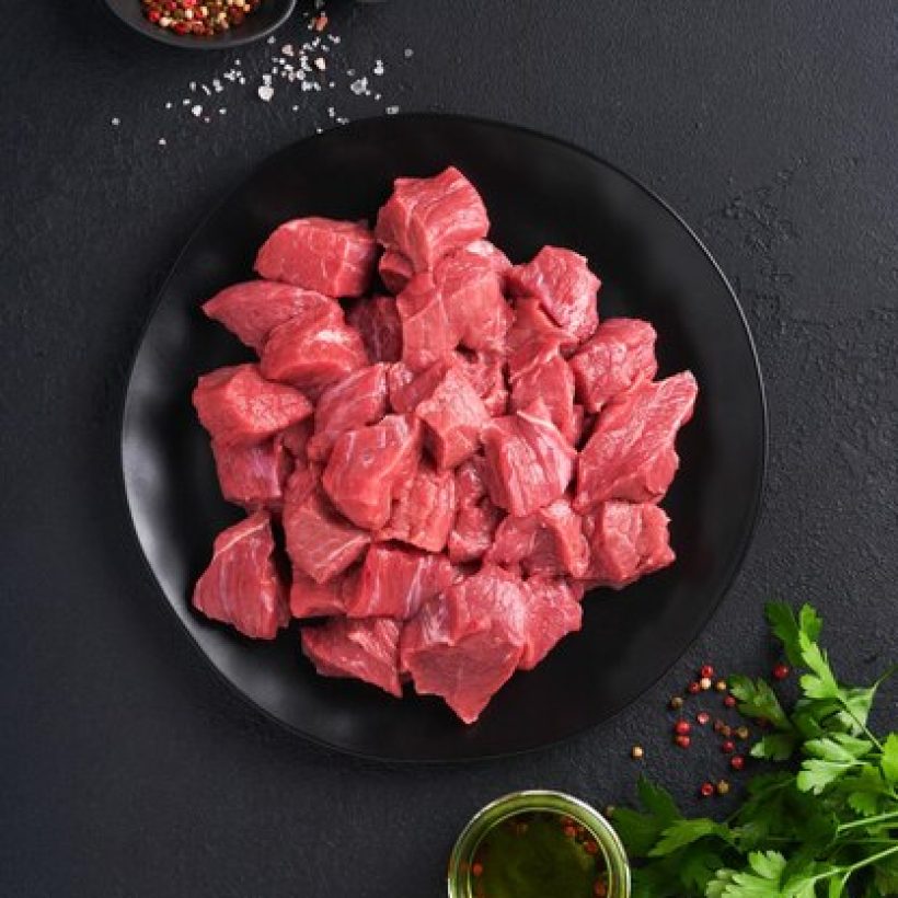 raw-chopped-beef-meat-raw-organic-meat-beef-lamb-spices-herbs-black-plate-dark-grey-concrete-background-goulash-raw-uncooked-meat-meat-with-blood-top-view-with-copy-space_253362-17917